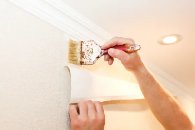 Pose de papier peint à Puits — revêtements muraux et toiles de verre